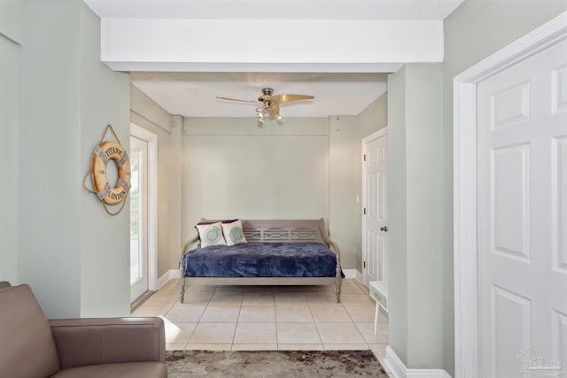 bedroom featuring ceiling fan and light tile patterned floors