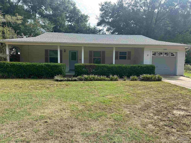 single story home with a front yard and a garage