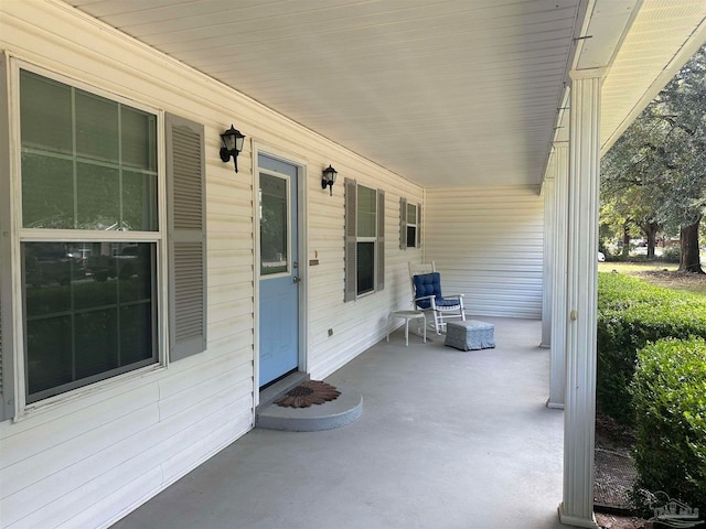 view of patio featuring a porch