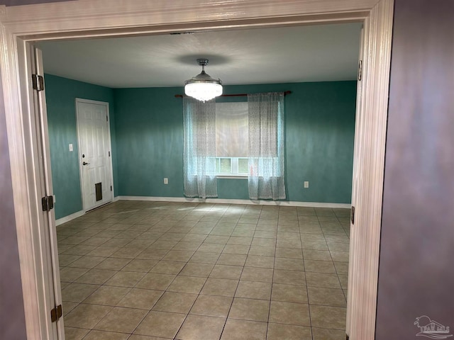 view of tiled spare room