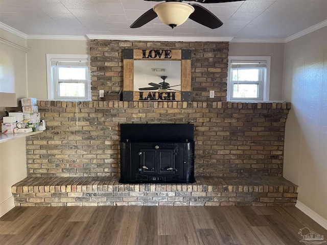 details with hardwood / wood-style floors, ornamental molding, and ceiling fan