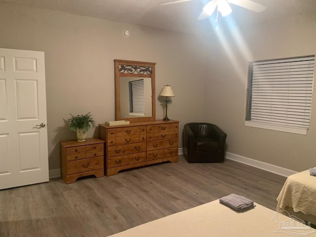 154 Ethel Wingate Dr Unit 210, Pensacola, FL 32507 - bedroom with wood finished floors, baseboards, and a ceiling fan
