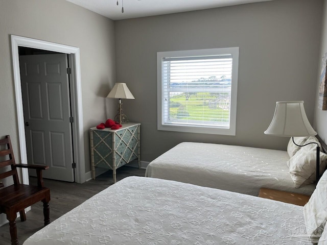 154 Ethel Wingate Dr Unit 210, Pensacola, FL 32507 - bedroom with wood finished floors and baseboards