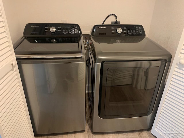 154 Ethel Wingate Dr Unit 210, Pensacola, FL 32507 - clothes washing area with washing machine and clothes dryer
