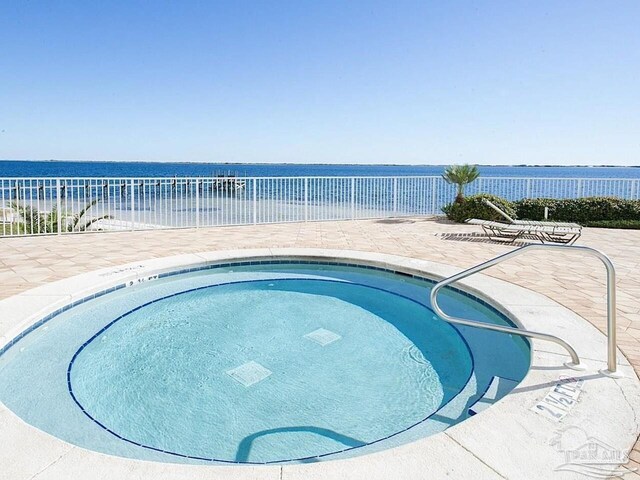 154 Ethel Wingate Dr Unit 210, Pensacola, FL 32507 - view of swimming pool with fence, a water view, a patio, and a pool