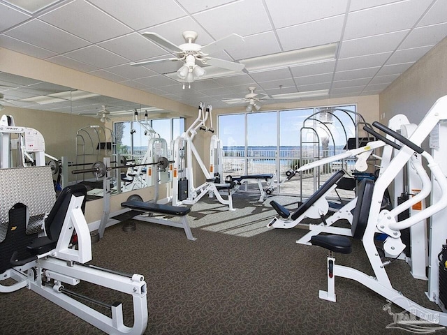 154 Ethel Wingate Dr Unit 210, Pensacola, FL 32507 - workout area featuring ceiling fan, carpet, and a paneled ceiling