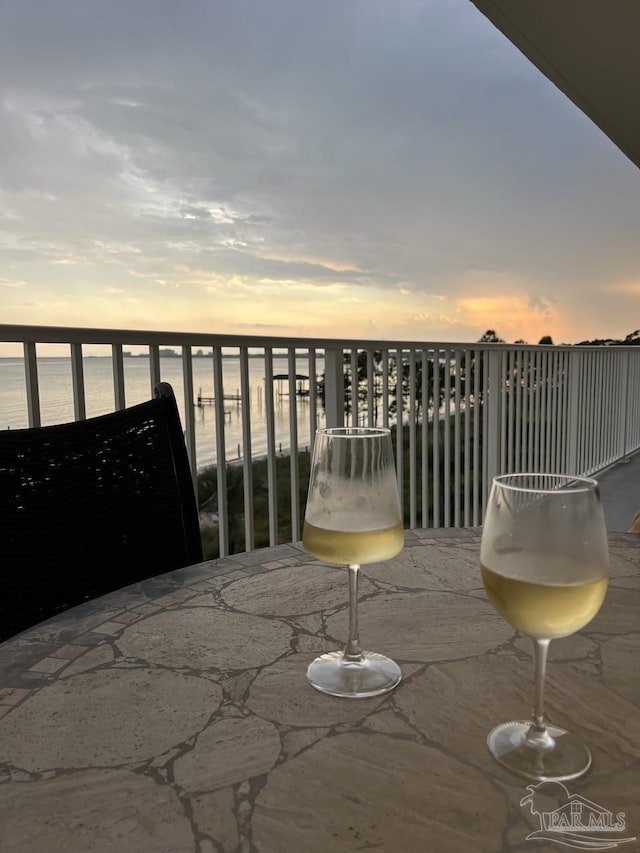 154 Ethel Wingate Dr Unit 210, Pensacola, FL 32507 - balcony at dusk with a water view