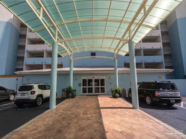 154 Ethel Wingate Dr Unit 210, Pensacola, FL 32507 - view of building exterior with uncovered parking