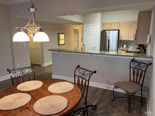 154 Ethel Wingate Dr Unit 210, Pensacola, FL 32507 - dining area featuring dark wood-style floors and baseboards