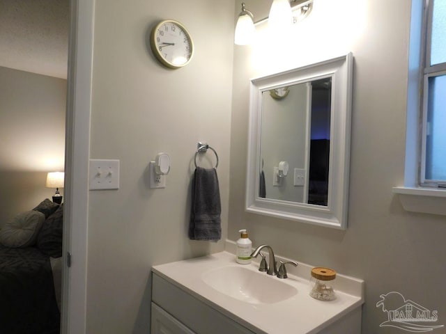 bathroom featuring vanity and a textured ceiling