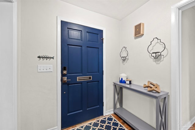 foyer entrance featuring hardwood / wood-style flooring