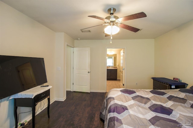 2191 Waltham St, Pensacola, FL 32505 - bedroom with wood finished floors, baseboards, a ceiling fan, and ensuite bathroom
