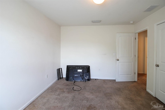 empty room featuring carpet