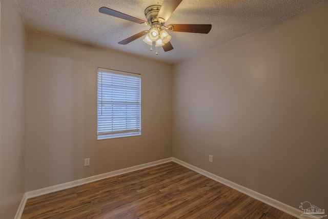 unfurnished room with a textured ceiling, ceiling fan, and dark wood-type flooring