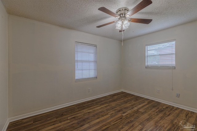 unfurnished room featuring ceiling fan, dark hardwood / wood-style flooring, and a textured ceiling