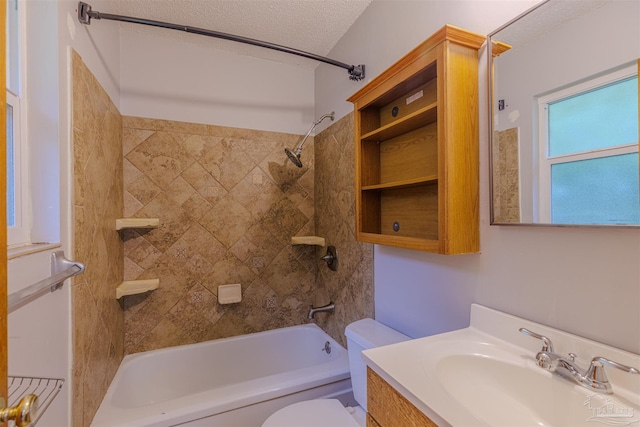 3255 Newton Dr, Pensacola, FL 32503 - bathroom featuring shower / bath combination, vanity, and a textured ceiling