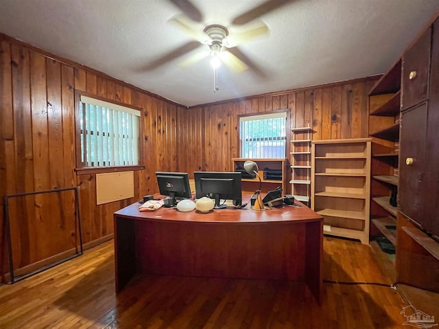 5457 Byrom St, Milton, FL 32570 - office featuring wood finished floors, ceiling fan, and wooden walls