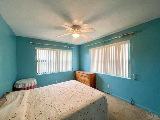 5457 Byrom St, Milton, FL 32570 - bedroom with multiple windows, carpet floors, and ceiling fan
