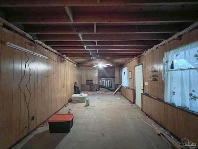 5457 Byrom St, Milton, FL 32570 - below grade area with wooden walls, a ceiling fan, and healthy amount of natural light