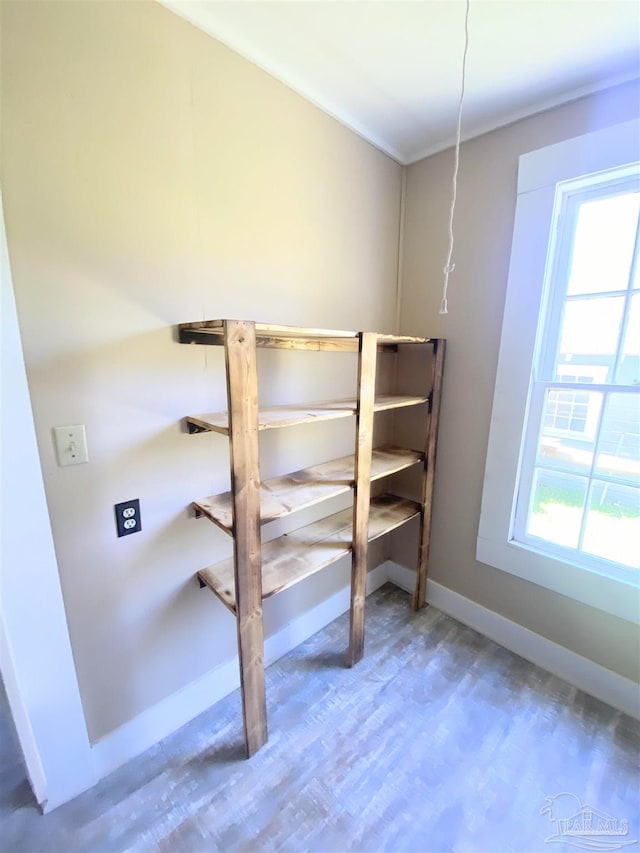 unfurnished bedroom featuring hardwood / wood-style flooring