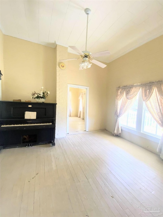 interior space featuring ceiling fan and light wood-type flooring