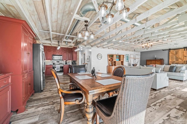 dining space featuring a chandelier, a barn door, wooden ceiling, and light wood-style floors