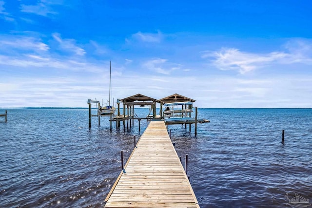 view of dock featuring a water view and boat lift