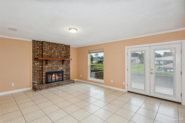 unfurnished living room featuring ornamental molding, a fireplace, and light tile patterned floors