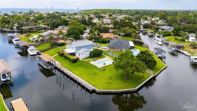 birds eye view of property featuring a water view