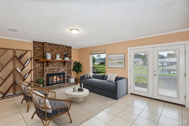 living room featuring crown molding, french doors, light tile patterned floors, and a brick fireplace