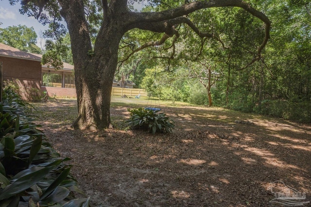 view of yard featuring fence