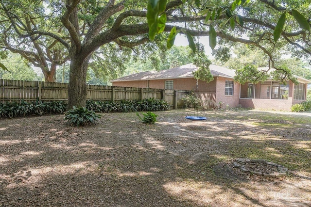 view of yard with fence