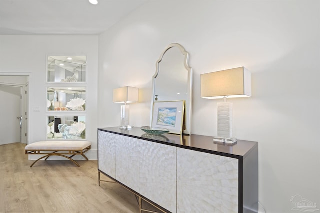interior space featuring wood finished floors and recessed lighting