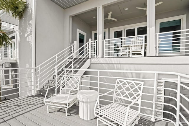doorway to property featuring stucco siding