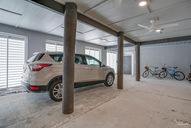 garage with a ceiling fan