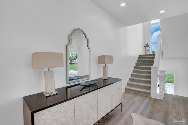 detailed view of wood finished floors and recessed lighting