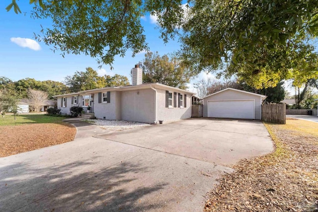 ranch-style home featuring a garage, a chimney, an outdoor structure, fence, and stucco siding