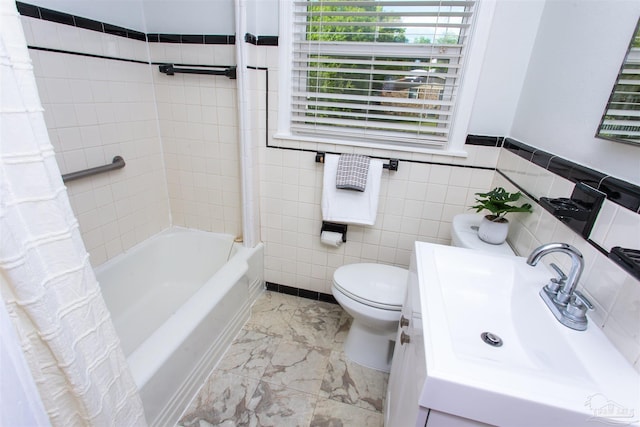 full bathroom with shower / bathtub combination with curtain, vanity, toilet, marble finish floor, and tile walls