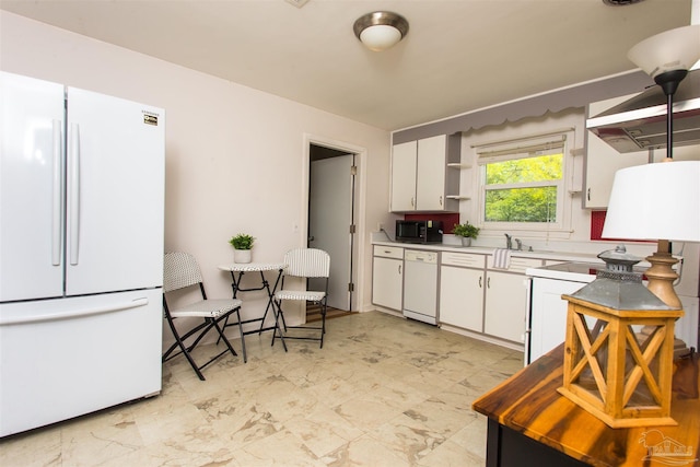 kitchen featuring white appliances, white cabinetry, light countertops, and open shelves