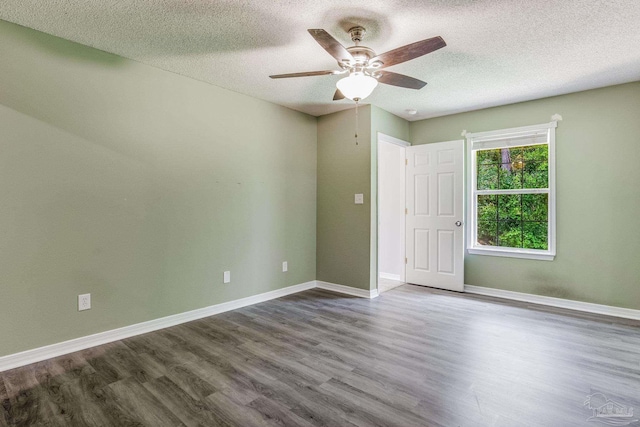 unfurnished room with ceiling fan, hardwood / wood-style floors, and a textured ceiling