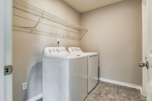 laundry area featuring washer and clothes dryer