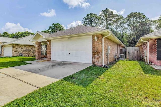 view of front of house featuring central AC, a garage, and a front yard