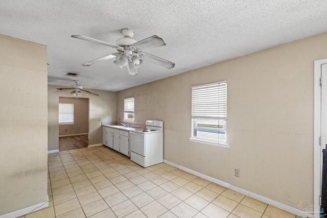 5220 San Miguel St, Milton, FL 32583 - laundry room featuring visible vents, a sink, light tile patterned flooring, baseboards, and ceiling fan