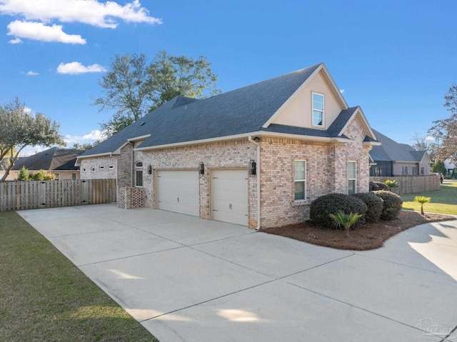 view of home's exterior with a garage, roof with shingles, fence, and brick siding