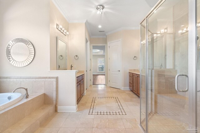 bathroom featuring ornamental molding, vanity, a shower stall, baseboards, and a bath