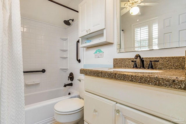 full bathroom with shower / bath combo, vanity, toilet, and ceiling fan