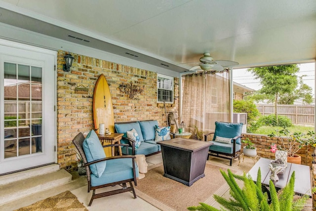 view of patio / terrace with ceiling fan and outdoor lounge area