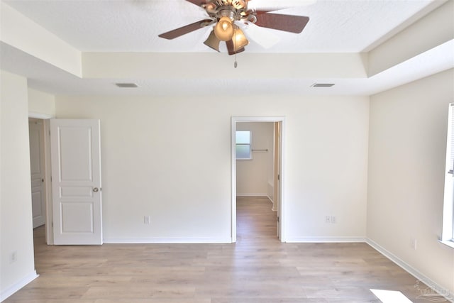 2608 Salamanca St, Navarre, FL 32566 - spare room with light wood finished floors, ceiling fan, and baseboards