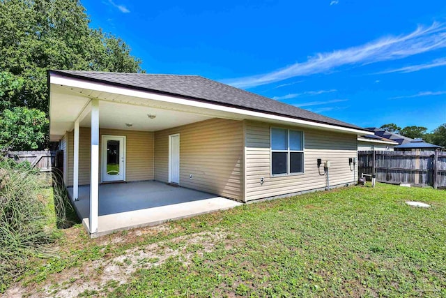 2608 Salamanca St, Navarre, FL 32566 - rear view of house with a patio