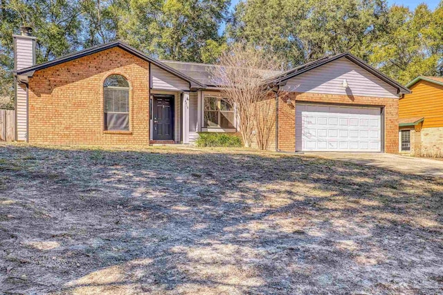 single story home with a garage